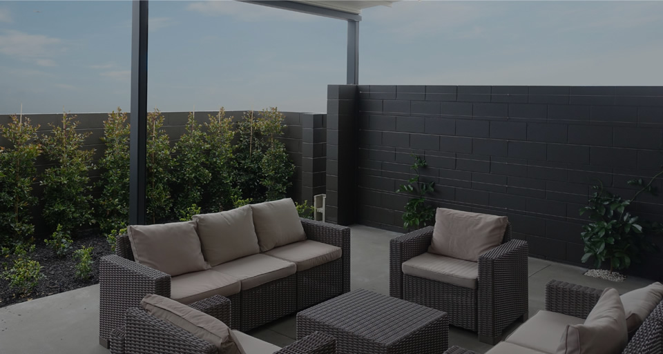 seating under fixed pergola awning